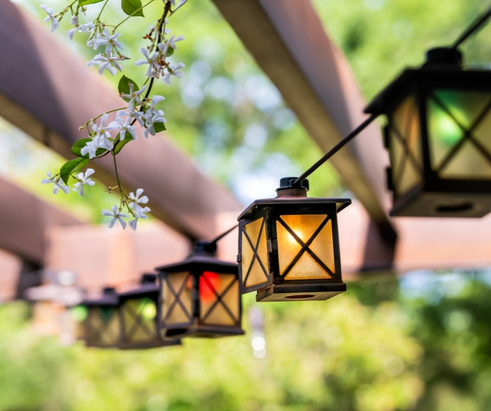 backyard lantern lights hanging over pavilion