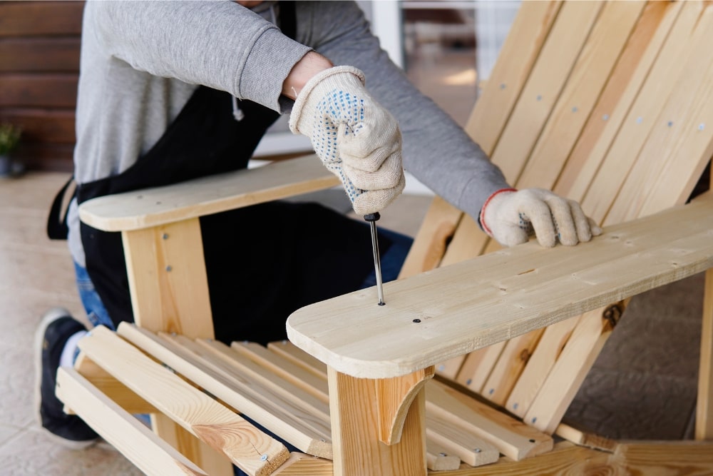 wooden muskoka chair being assembled