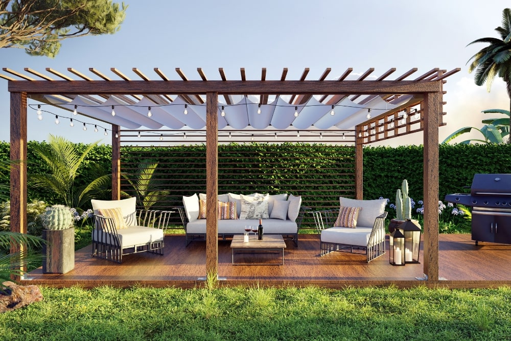 pergola in backyard with furniture
