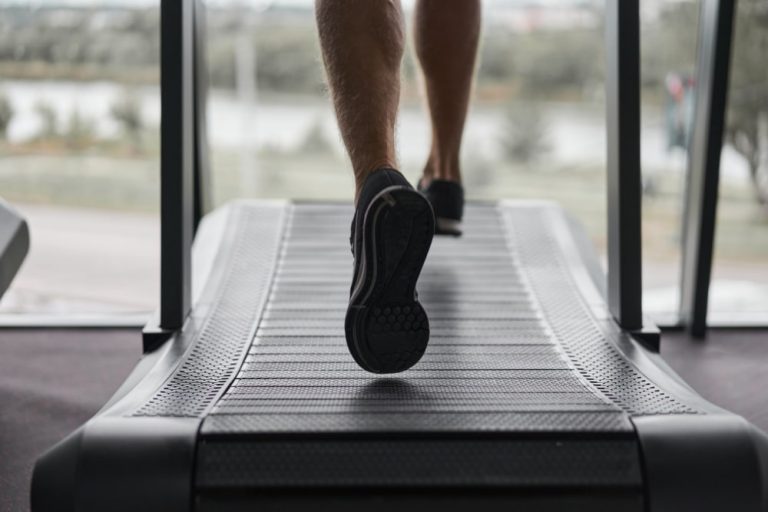 a man running on a treadmill gym